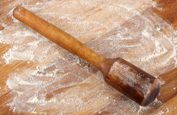 istock white flour on rustic wooden table, top view 888346250