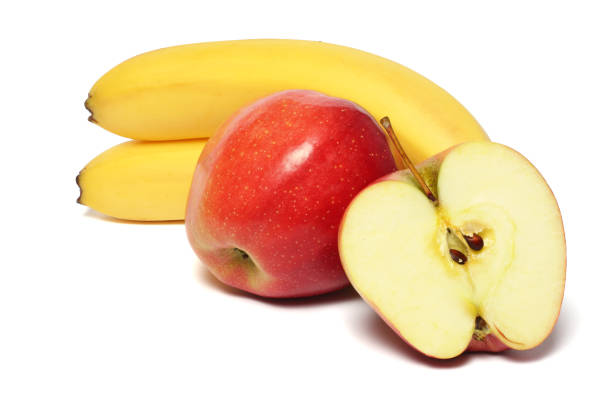 istock banana with red apple isolated on white background 888346778
