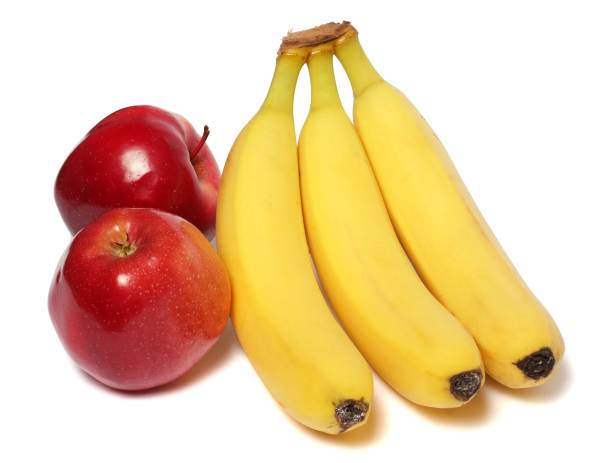istock banana with red apple isolated on white background 888346780