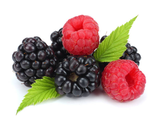 istock blackberries with raspberries and green leaf isolated on white background. macro 888347048