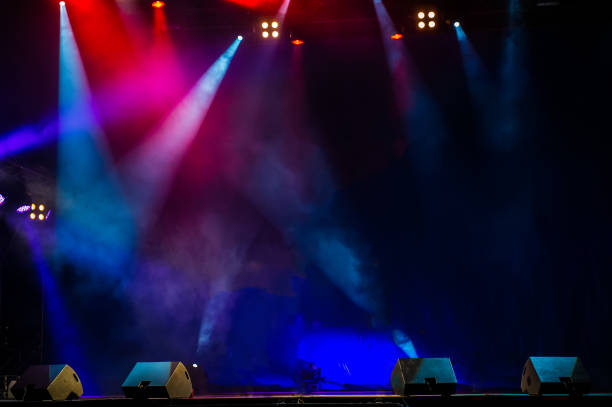 Performance moving lighting. Concert Light Show. Stage Lights. Concert stage. Beautiful Colourful disco lighting in the stage. Performance moving lighting. Concert Light Show. Stage Lights. stage performance space stock pictures, royalty-free photos & images