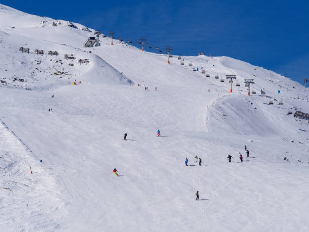 istock Skiers on Alpine slope 888375006