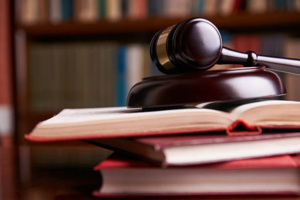istock Judges gavel with law books 888381542