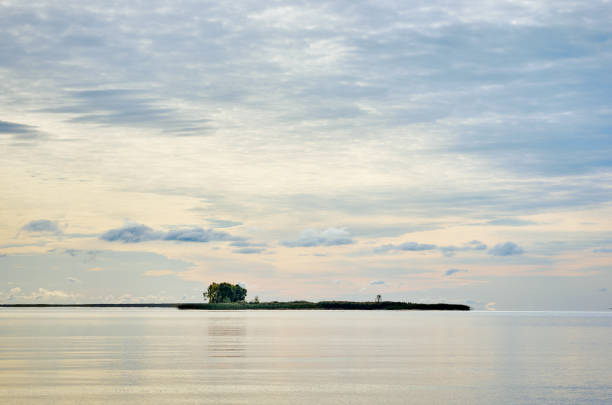 istock Clouds reflected water landscape, plant, horizon, island 888381690