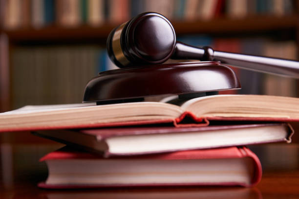 istock Judges gavel with law books 888387294