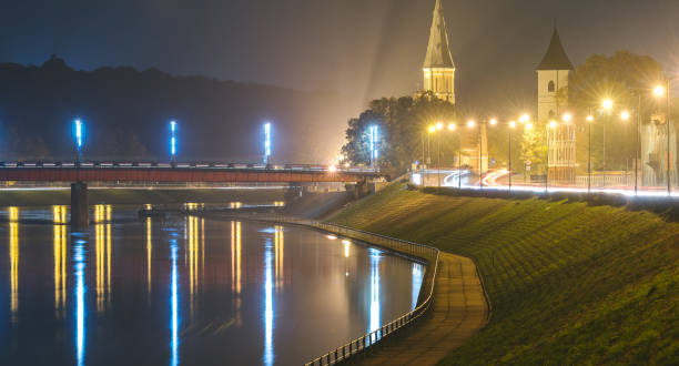istock Illuminated Bridge In City Against Sky At Night 888403722
