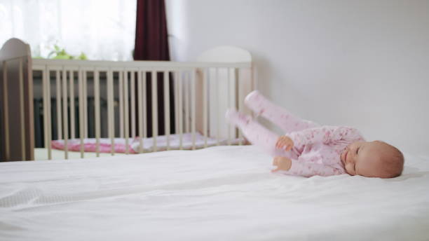 istock Baby Crawling on All Fours on the Bed 888412658