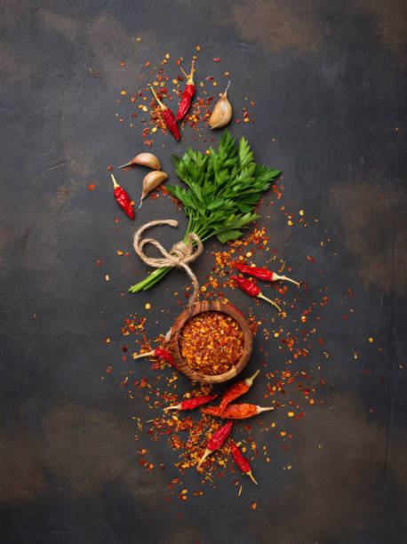 istock Red chili peppers, garlic and parsley 888418390