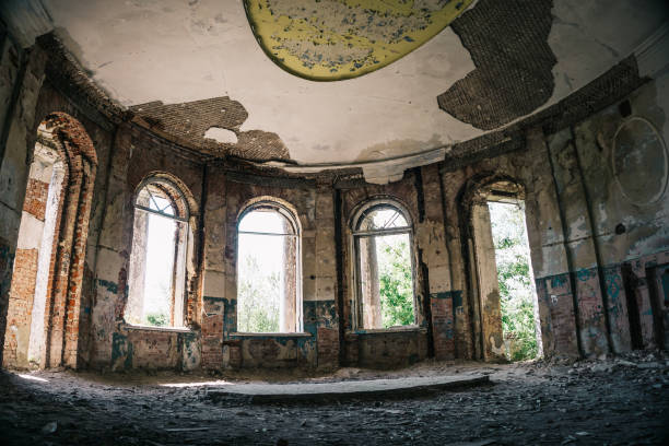 istock Haunted mansion, abandoned ancient building inside interior with arch windows 888422258