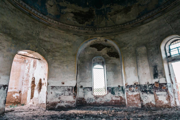 istock Haunted mansion, abandoned ancient building inside interior with arch windows 888424746
