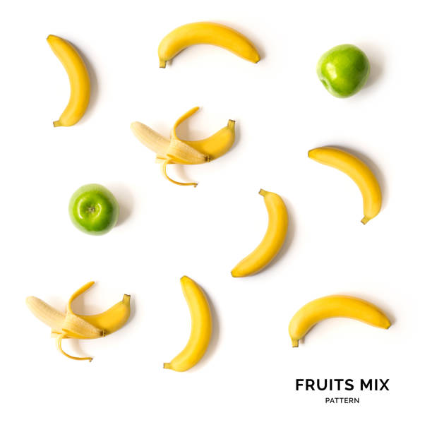 istock Seamless pattern with fruits. Tropical abstract background. Banana and apple on white background. 888439780