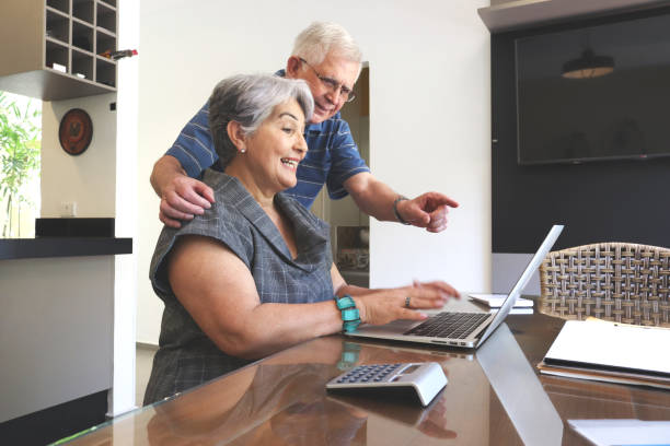 istock Senior couple and tecnologies 888492736