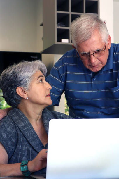 istock Senior couple and tecnologies 888494860
