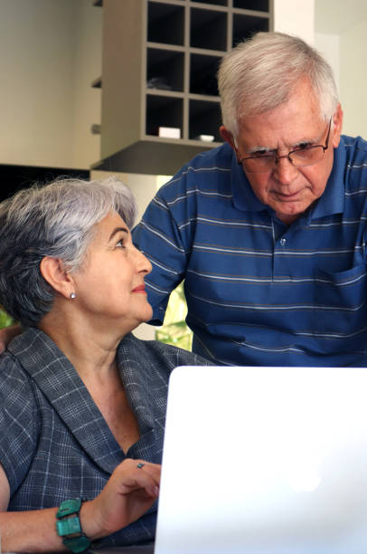 istock Senior couple and tecnologies 888494978