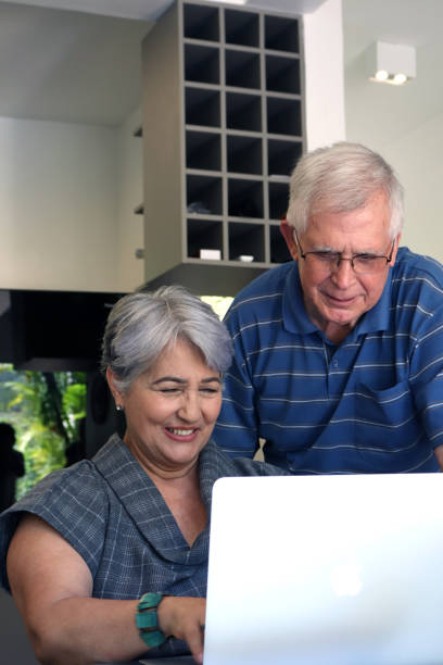 istock Senior couple and tecnologies 888494996