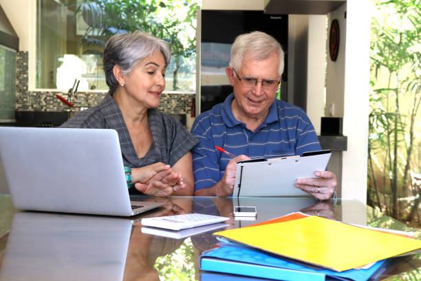 istock Senior couple and tecnologies 888497856