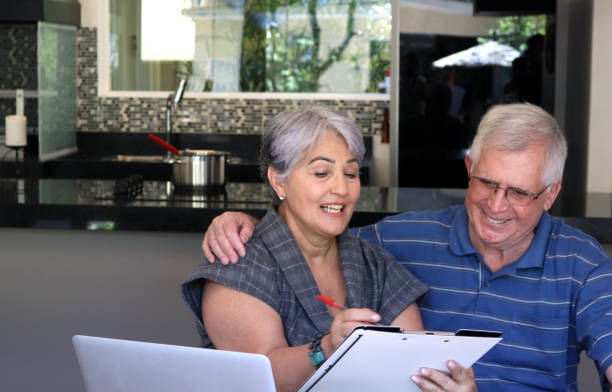 istock Senior couple and tecnologies 888497876