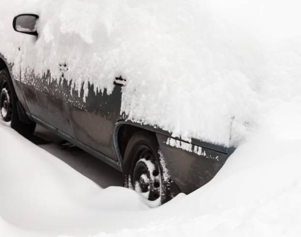 istock Car in the snowdrift on the parking lot 888503590