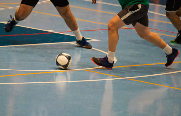 istock Futsal player  sports hall 888503694