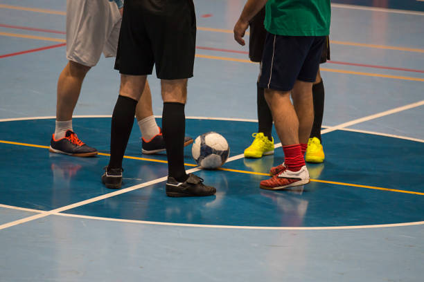 istock Futsal player  sports hall 888503712