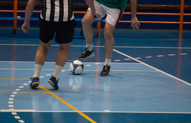 istock Futsal player  sports hall 888503872