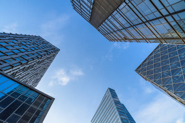 istock High modern skyscrapers over blue sky 888509098