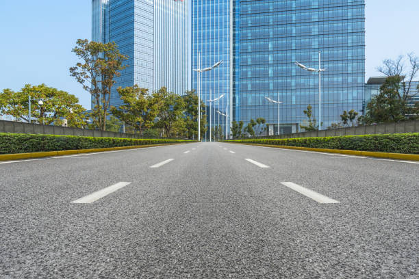 istock City road through modern buildings in china 888517782
