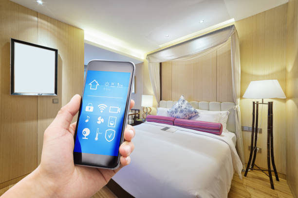 istock smart phone with smart home with modern bedroom 888525944