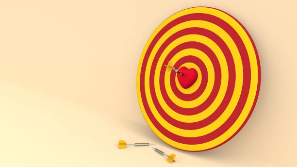 istock Darts hitting in the target heart 888532032