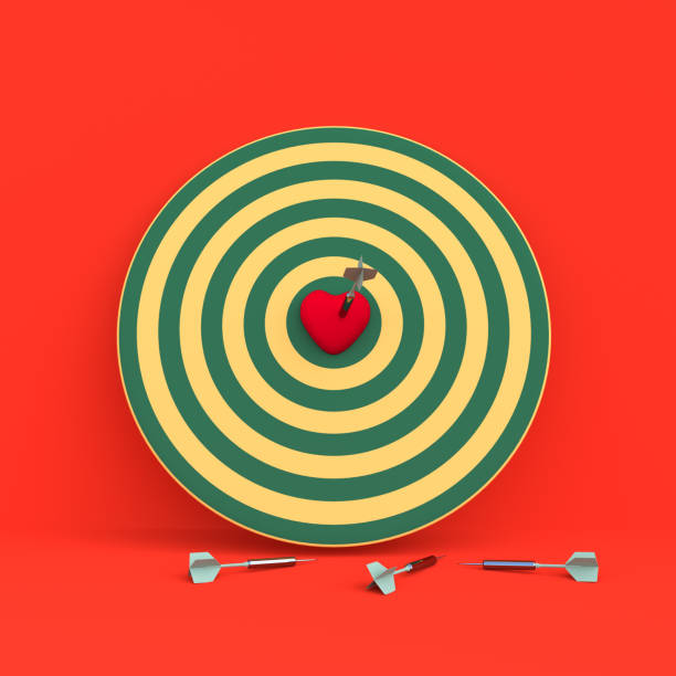 istock Darts hitting in the target heart 888532058