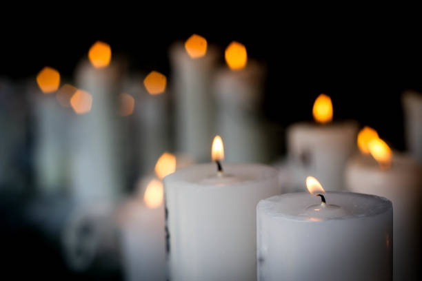 istock white candle light in the dark 888532324