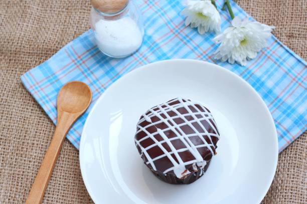 istock Chocolate cupcakes of sweet time 888546490