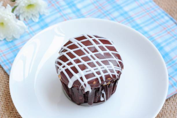 istock Chocolate cupcakes of sweet time 888546664