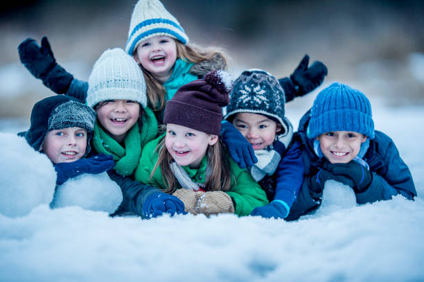 istock Group Of Kids In Winter 888548972