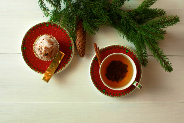 istock winter cup of tea and Christmas decorations 888571710