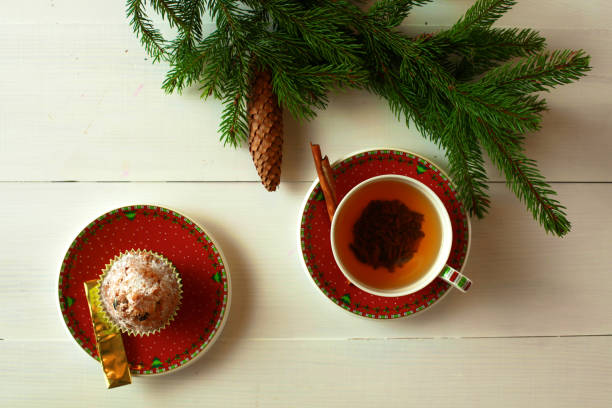 istock winter cup of tea and Christmas decorations 888571734