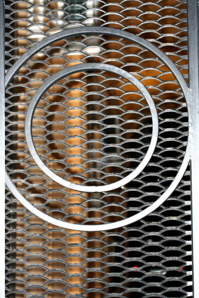 istock Decorative oval small metal mesh. Wicket with round ornaments 888587508