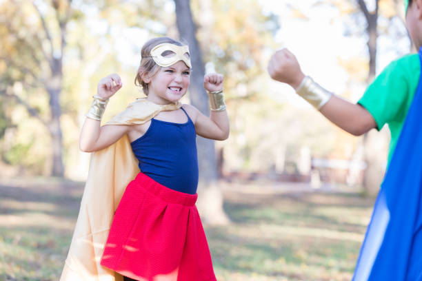 istock Children pretend to be superheroes 888620678
