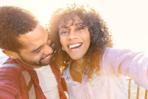 istock Attractive couple enjoy vacationing together 888622820