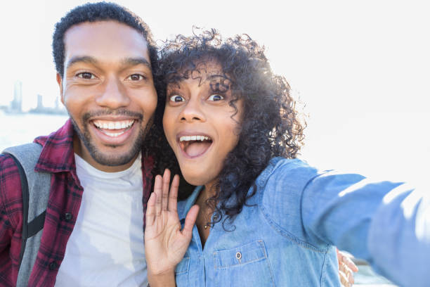 istock Fun couple on vacation in a large city 888622844