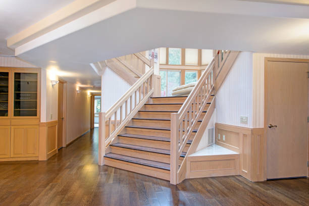 istock White wooden hallway interior accented with a beautiful staircase 888647618