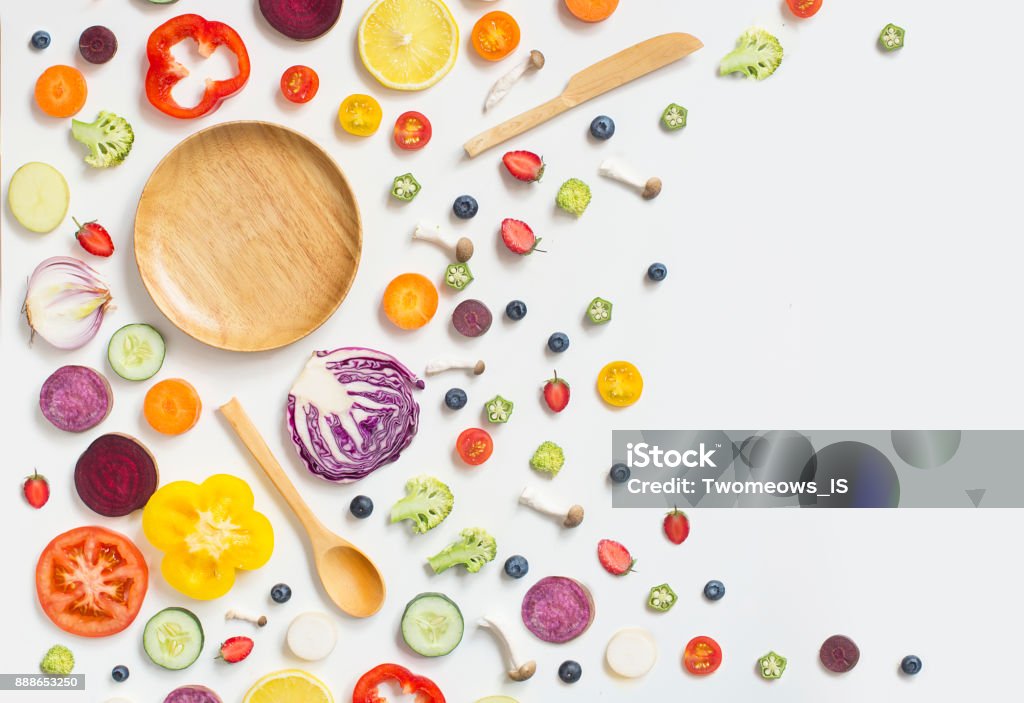 Flay lay healthy eating vegan food still life. Conceptual flay lay healthy eating vegan food slice still life. Pink background text space image. Vegetable Stock Photo