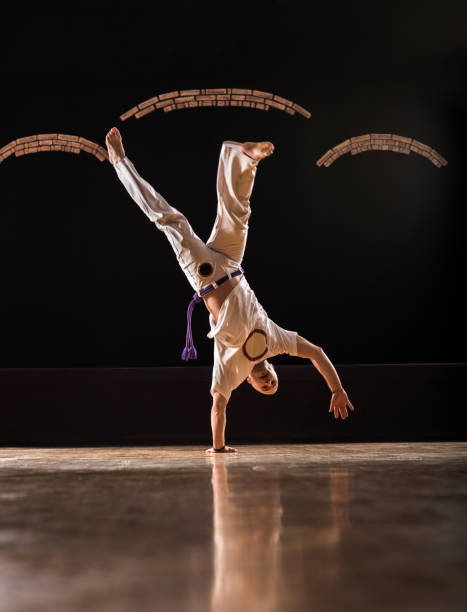 istock Athletic man having a capoeira training in a health club. 888653532