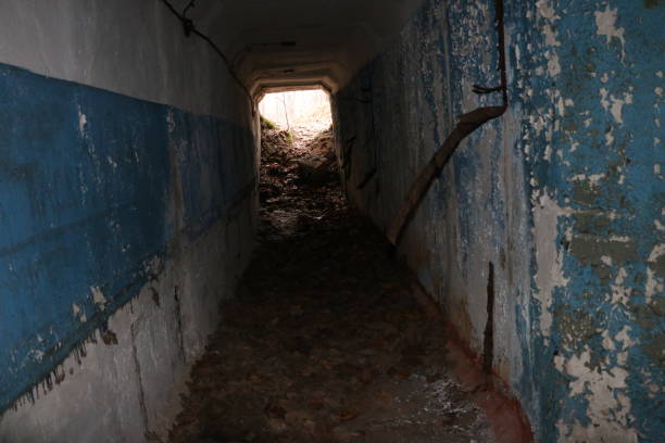 istock the old destroyed military base of missile forces after the explosions with the command post and the bomb shelter thrown in the woods 888660156