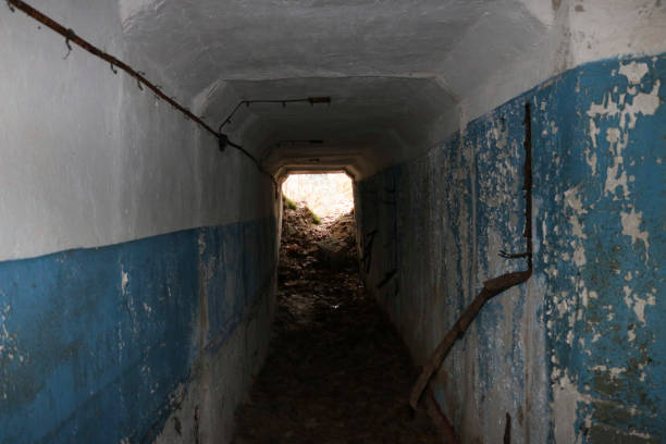 istock the old destroyed military base of missile forces after the explosions with the command post and the bomb shelter thrown in the woods 888660164