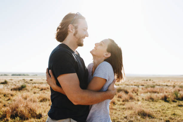 istock Couple hiking together in the wilderness 888660212