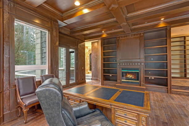 istock Chic Wood Paneled Home office features coffered ceiling 888666582