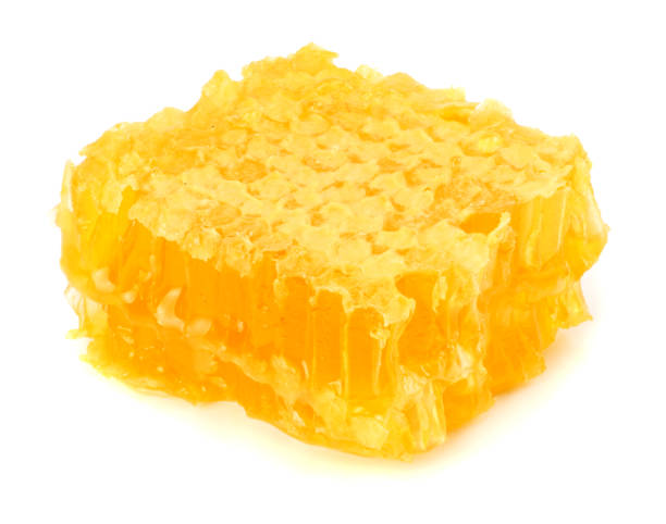 istock Honeycomb isolated on white background close up 888670352