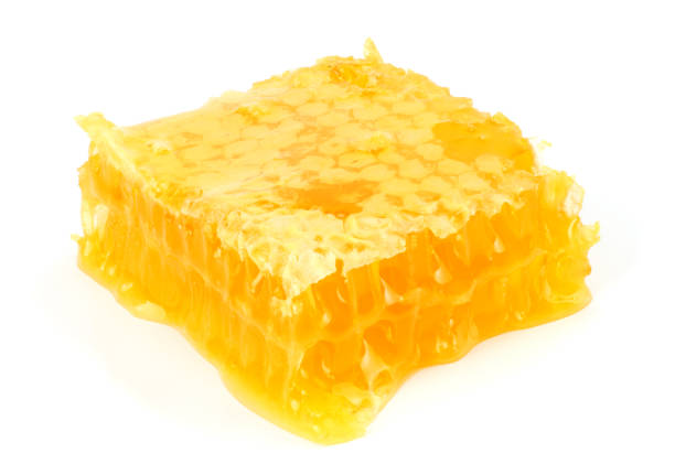 istock Honeycomb isolated on white background close up 888670782