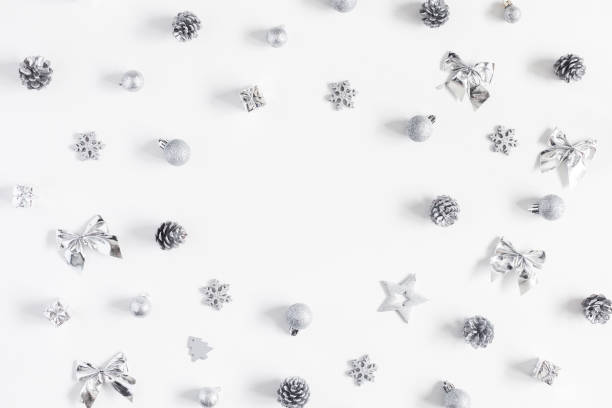istock Christmas white, silver decorations, pine cones. Flat lay, top view 888672244